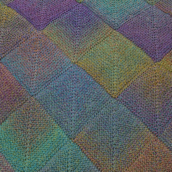 Châle tricoté Domino
2