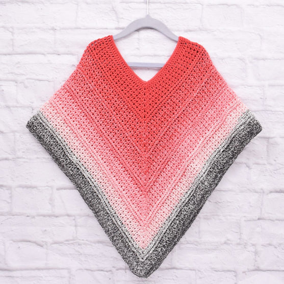 Poncho Enfant Timeless – Twister
6