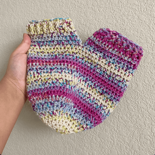 Hand Holding Mittens