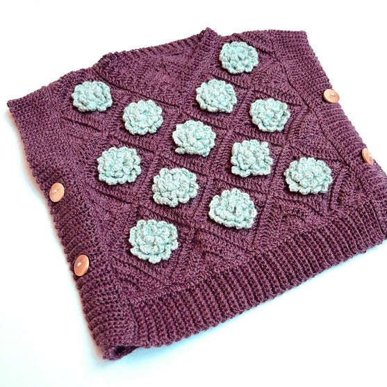 

Snowrose - Children’s Vest
5