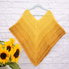 

Timeless Child Poncho – Sultan
3