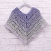

Classical Attitude Poncho – Child
4