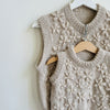 

Alice - Pull sans manche
8
