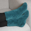 

Canapé chaussettes - Chaussettes crochetées
3