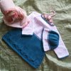 

Teal Darling - Babyjurk en muts
5