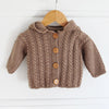 

Cabled jacket with hood - Baby
3
