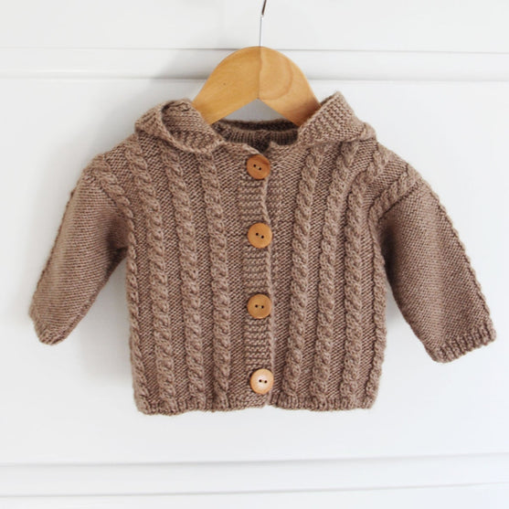 

Cabled jacket with hood - Baby
3