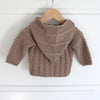 

Cabled jacket with hood - Baby
4