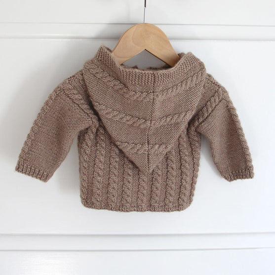 

Cabled jacket with hood - Baby
4