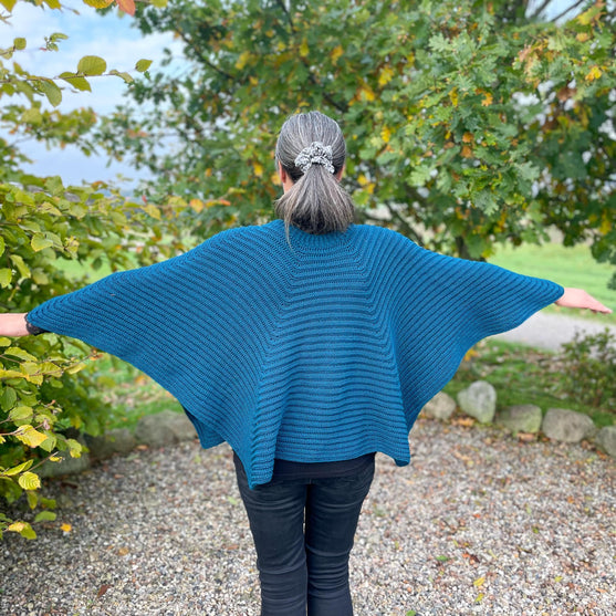

Embrace - Capelet
4
