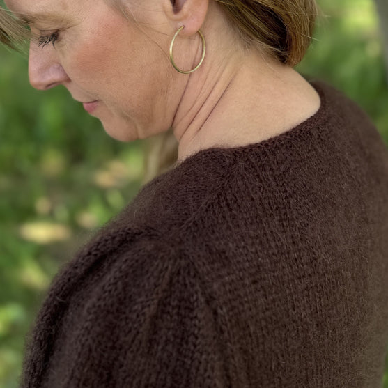 

Kastanje - Cardigan
5