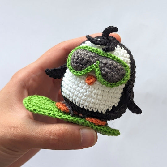 Brady - Le pingouin snowboarder