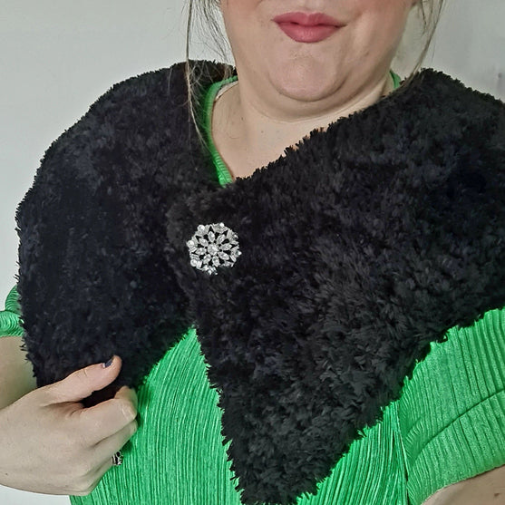 

The Snug Bug Shrug - Shrug
2